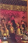 Statue of Enzhugong (Kitchen God, Guan Yu and Lü Dongbin) inside the temple