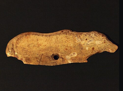 Magdalenian bear pendant made out of a deer rib