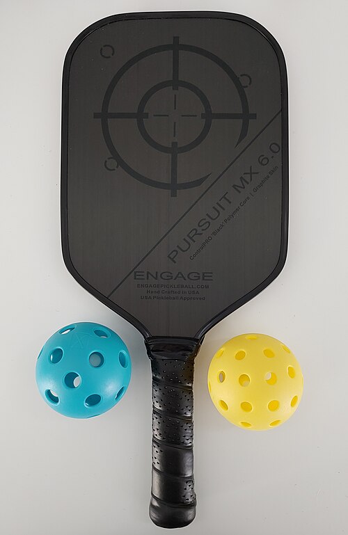 File:A pickleball paddle with two pickleballs.jpg