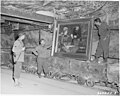 The painting was brought along with other pictures from the German National Gallery to a mine to protect it from the bomb war in World War II. This 1945 photograph shows US soldiers with the painting in the Merkers salt mine.