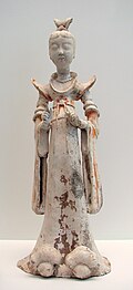 Tomb figure from the 7th–8th century of a lady attendant during the Tang era. Female hosts prepared feasts, tea parties, and played drinking games with their guests