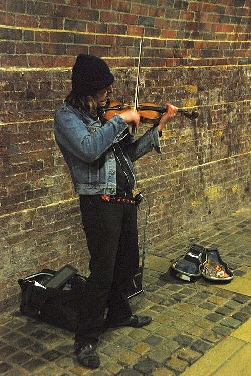 File:Busking under a bridge.jpg