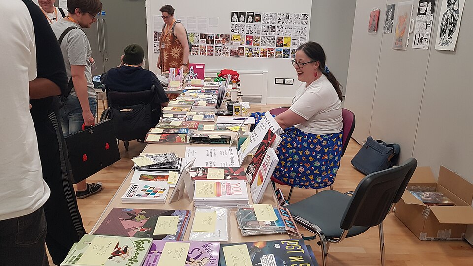 File:Caption 2025 REBIRTH Community Comics Stall.jpg
