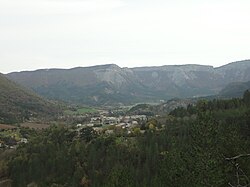 The village of Valbelle nestled in the valley, and the cirque