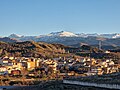 View of Beas de Granada and Sierra Nevada in the background