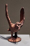 Griffin-Shaped Coffin Nail (replica), 4th-3rd century BCE. Gilt Bronze. Berel Kugan, East Kazakhstan. National Museum of the Republic of Kazakhstan.