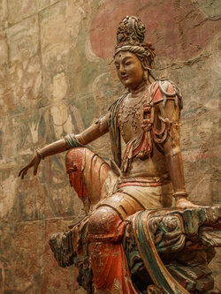 Water-Moon Guanyin, Liao dynasty (11th–12th century). Wood with polychrome and gold. Nelson-Atkins Museum of Art.