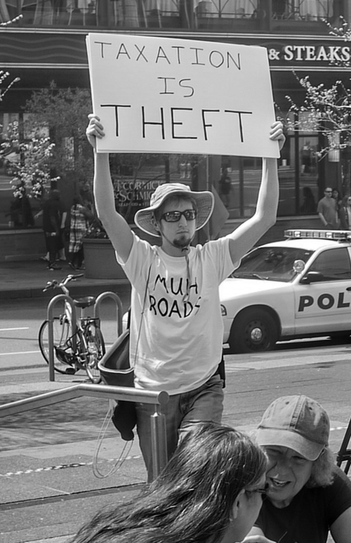 File:Taxation is Theft.png