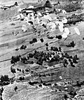 B-17 dropping supplies.