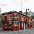 Red-brick pub with glazed tiles