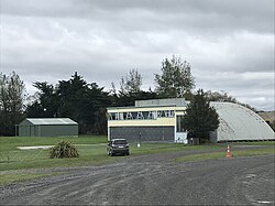 Building with a domed hanger