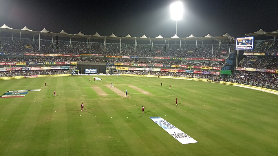 File:Barsapara Cricket Stadium match under floodlights.jpg