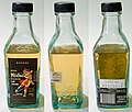 Image 41Various views of a bottle of mezcal. The "worm", which is actually the larval form of the moth Hypopta agavis that lives on the agave plant, can be seen in the middle image, at the bottom of the bottle. (from List of alcoholic drinks)