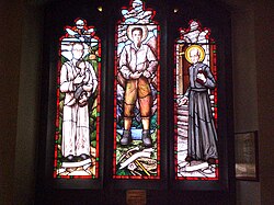 St. Thomas Aquinas Church stained glass windows of Óscar Romero, Pier Giorgio Frassati and André Bessette, Toronto, Canada