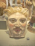 An ancient Greek pottery (terracotta) figurine from Taras (modern Taranto), Magna Graecia, Altes Museum