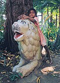 Image 18A girl in Udaipur playing "Jungle Child" (from Girls' toys and games)