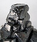 Image 23Galena, PbS, is a mineral with a high specific gravity. (from Mineral)