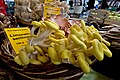 Photograph of a basket of mushrooms for sale at a market