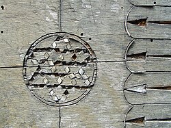 Decaying wood inlay on a chest in a Greek monastery.
