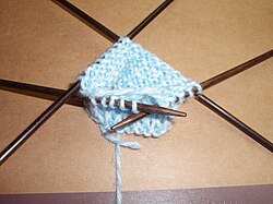 Unlike crochet, knitting requires specialized needles to create circular rounds.