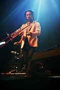 Masahiko Kitahara on trombone and sousaphone  (Original Member)