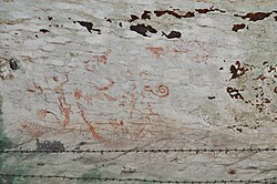 Boats and human figures in a cave painting in the Niah National Park of Sarawak, Malaysia; an example of the Austronesian Painting Traditions
