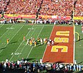 Joe McKnight scores a rushing touchdown against UCLA