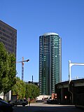 The Infinity II in mid-August, with exterior cladding work complete. The crane for The Infinity I can be seen on the left.