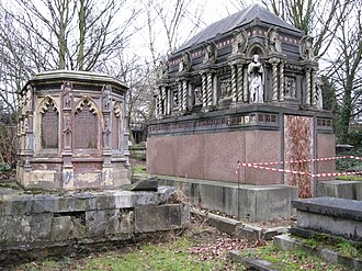 The iron monument of Grissell on left, grade II, the granite and limestone mausoleum of Alexander Berens by E.M. Barry on right, grade II*