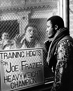 Promotional photo taken in January by George Kalinsky, showing Ali outside Frazier's training headquarters