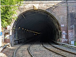 A semicircular brick tunnel entrance