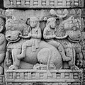 Men on lions.
