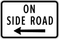 On side road (left)