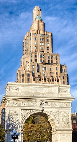 Art Deco Building by Harvey Wiley Corbett on 1 Fifth Avenue, rising behind Washington Square Arch