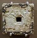 Plaque_with_female_and_male_figures, Tell Asmar Single-Shrine Temple III – Early Dynastic period, 2500–2330 BC, alabaster, shell and bitumen