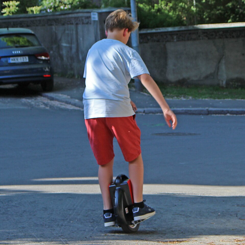 File:Boy riding Solowheel.jpg