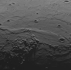 The prominent wrinkle ridge across the center is Schiaparelli Dorsum.
