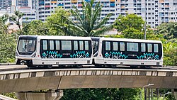 A Bombardier Innovia APM 300R C801B running on the guiderails.