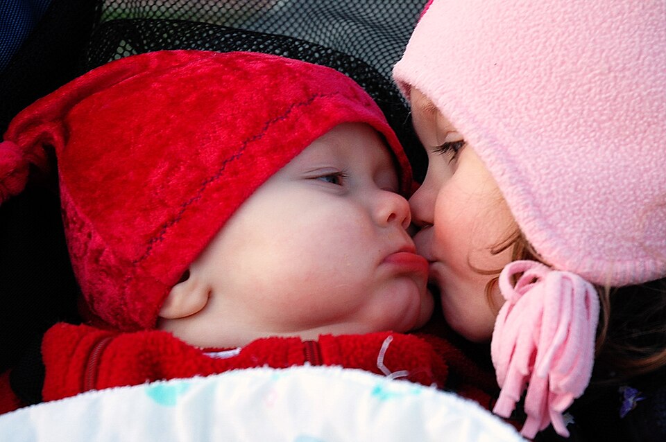 File:Smooches (baby and child kiss).jpg