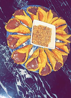 Contemporary qatayef with Nutella filling.