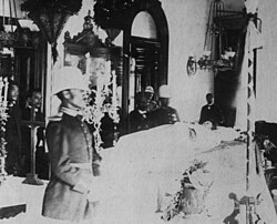 deceased woman lying on a bed