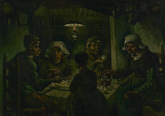 Two men and three women eating potatoes