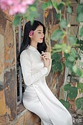 A girl wearing white Áo dài