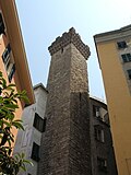 Embriaci Tower, built in the 12th century by the noble Embriaci family. When it was decided in 1196 that no tower could exceed 80 palms (roughly 20 m), this one, which reached a height of 165 palms, was spared, probably in honor of the exploits of Guglielmo Embriaco. Historian Federico Donaver, in his Le Vie di Genova (1912), points out that, at the time the tower was erected, the Embriaci family “owned almost the entire locality of Castello, but also had houses and towers in other parts of the city.”