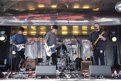 Sly Withers performing in May 2025