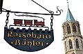 Nasenschild eines Reisebüros in Rottweil (2017)