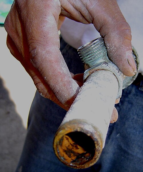 File:Rusted water pipe.jpg