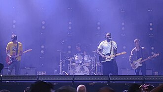 Bloc Party performing live in 2025. From Left to Right: Lissack, Bartle, Okereke and Deacon
