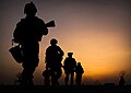 U.S. Marines conducting a dawn patrol in Afghanistan's Nawa District, Helmand Province, 2010