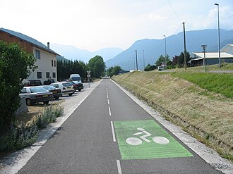 Paved bicycle path designed exclusively for cyclists, clearly marked and separated from motor vehicle traffic, illustrating a typical bike path environment.